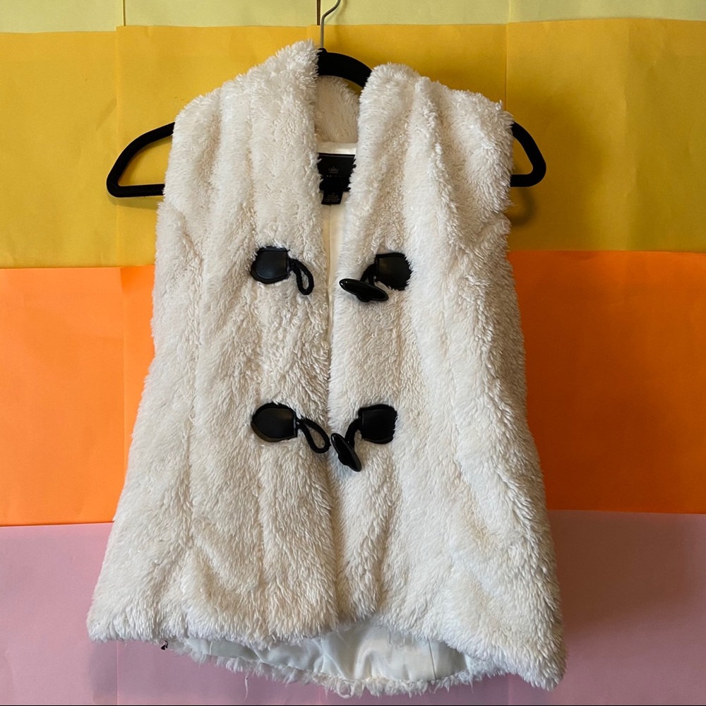 White fluffy vest